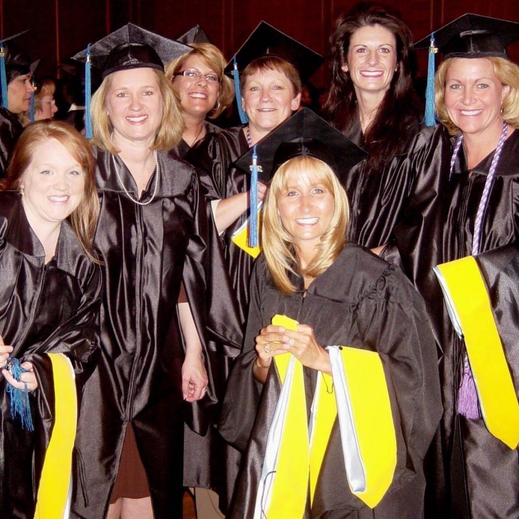 Kim dressed in cap and gown at commencement