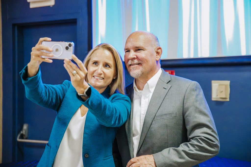 Kim and Jeff Pagano taking a selfie
