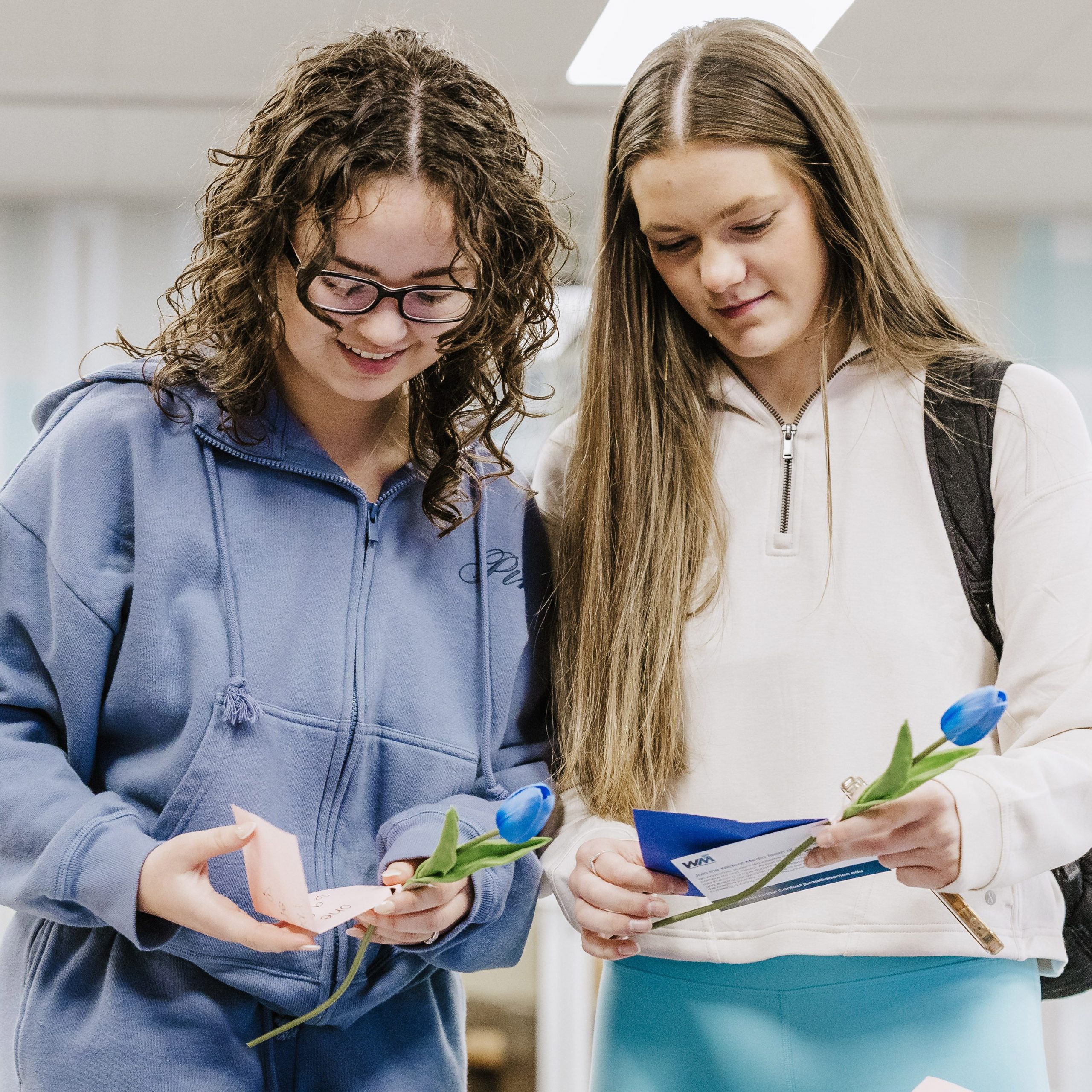 two students receiving their armations during Wildcat Media Team’s CHIP collaboration.