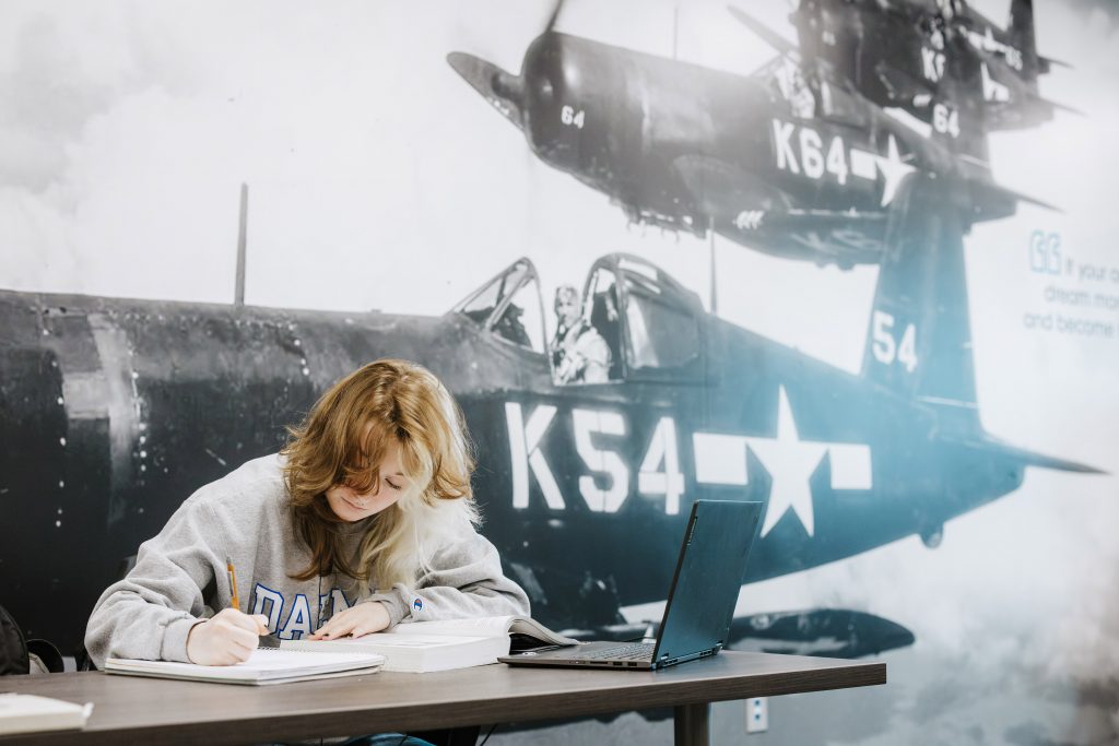 Veteran student working on homework on veterans lounge