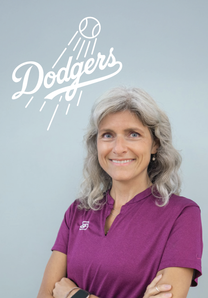 Sue Falsone with Dodgers logo behind her