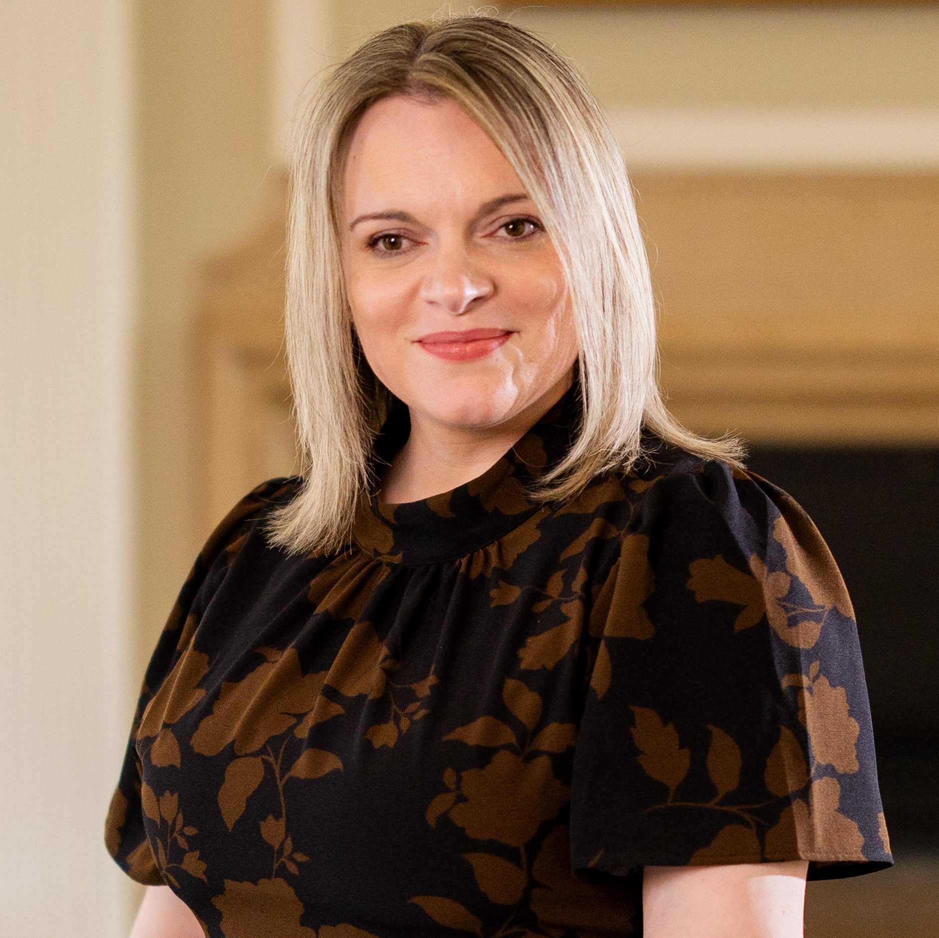 Kathryn (Belliotti) Hammer ’06 in rosary hall parlor room