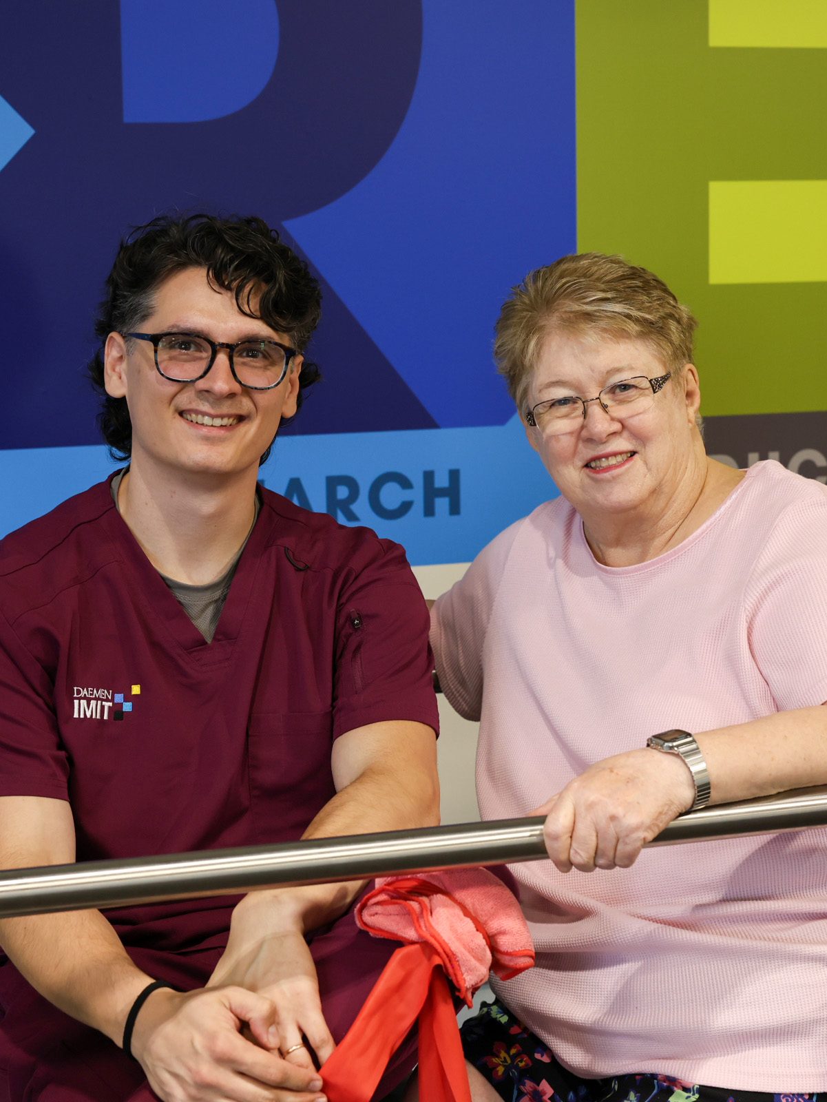 Tom Danat poses with one of his patients in the Kennedy Institute
