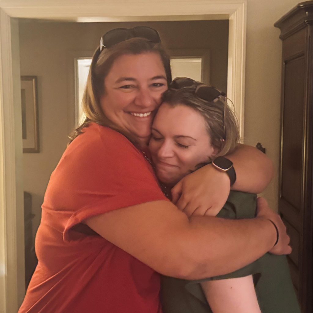 Two women hugging