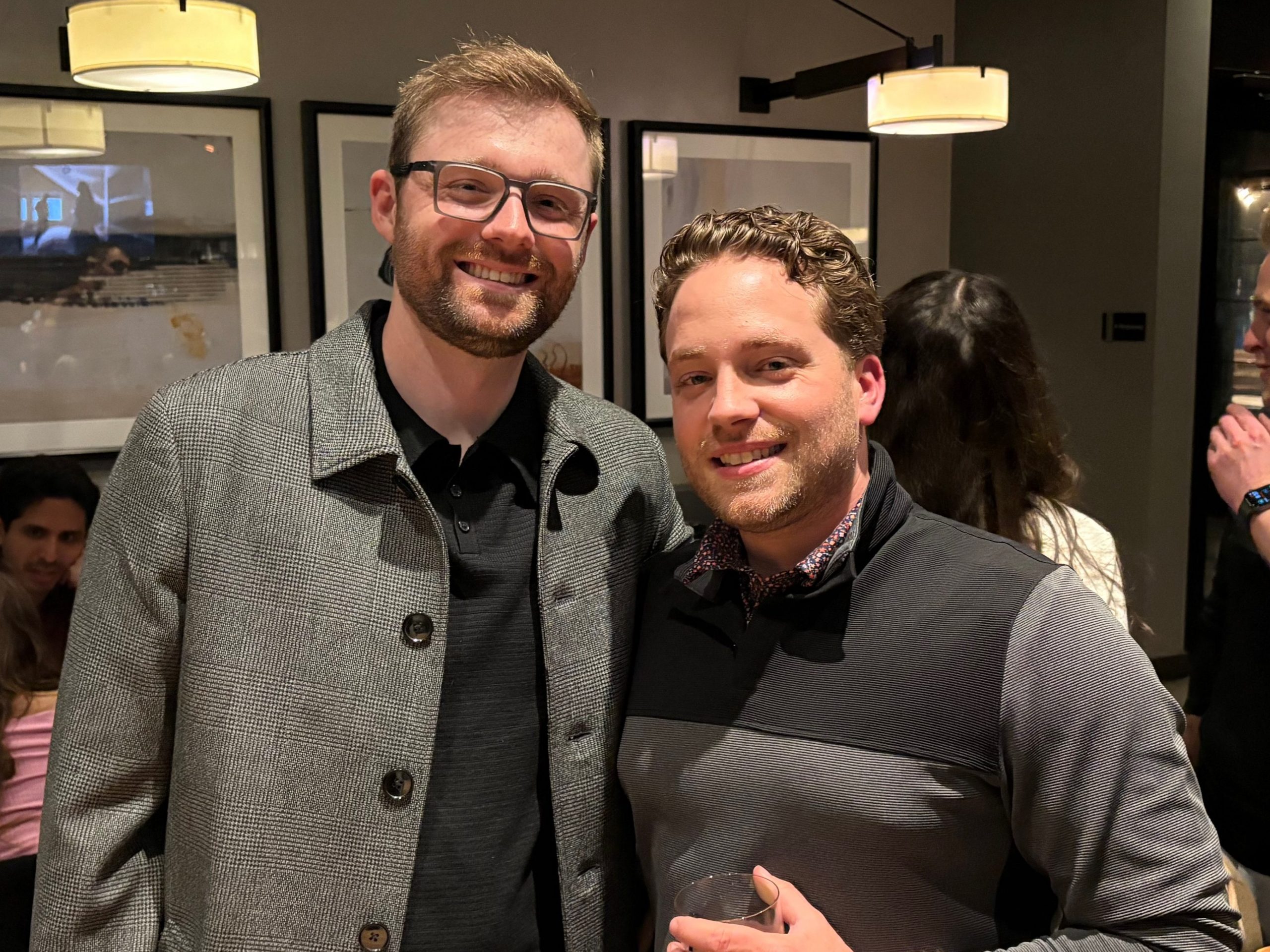 Two men standing together